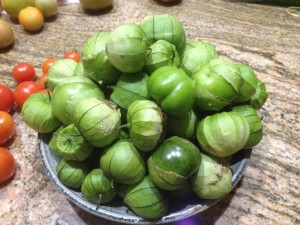 Growing tomatillos at home gives you an unusual vegetable to try in the kitchen